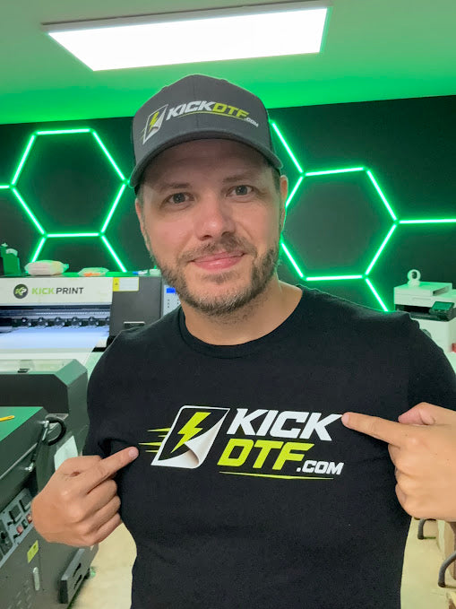 JT, founder of Kick DTF, in the Kick DTF print shop